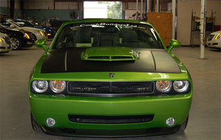 Illustration for article titled Financiapocalpyse Kills One Drop Top Muscle Car, Delays Another